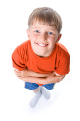 Amusing portrait of the boy with the crossed hands