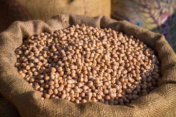 Burlap sack with chickpeas close-up