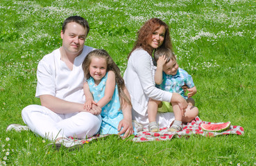 Fototapeta premium Happy family have picnic in the park