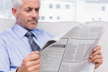 Businessman reading the news