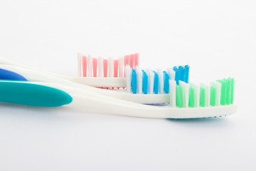 Red, green and blue toothbrush