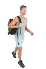 Handsome man in sportswear walking