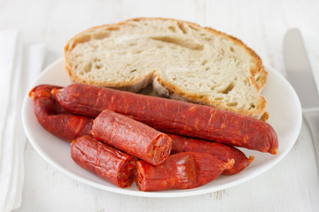 sausages with bread on the plate