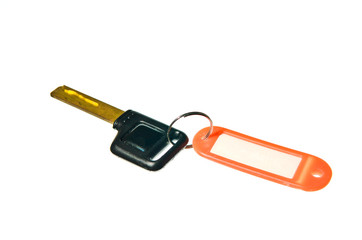 old key attached to a plastic keychain