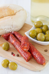 sausages with olives and wine