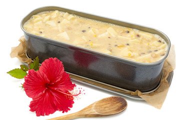 Fresh fruit cake butter in metal form ready to go in oven
