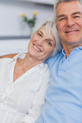 Fototapeta na wymiar Elderly couple embracing