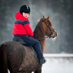 Horse and boy - riding horseback