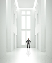 businessman standing in bright office