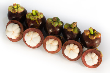 Asian tropical mangosteen fruit on white background