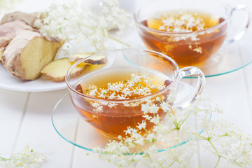 Cup of elder flower tea with ginger