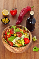 Wooden bowl with salad