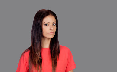 Fototapeta premium Attractive brunette girl dressed in red