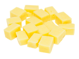 small cheese dices on white background