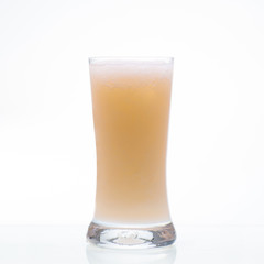 Cantaloupe shake drink in glass isolated