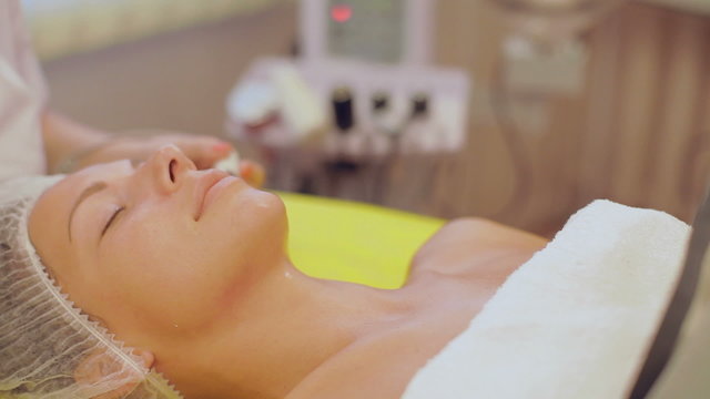 beautiful girl lies in the beauty salon