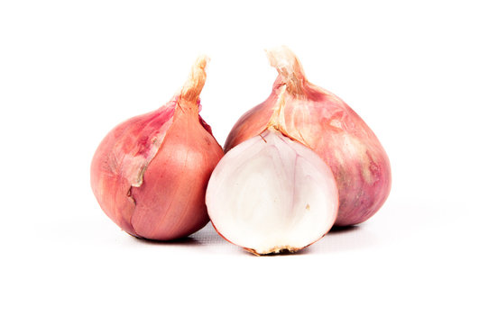 Raw red onion isolated on white background with clipping path