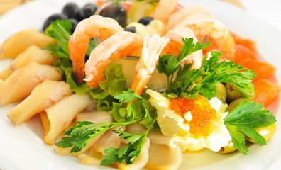 Shrimp, red fish, served with red caviar and olives.