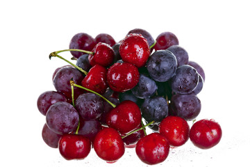 cherries and grape isolated on white background