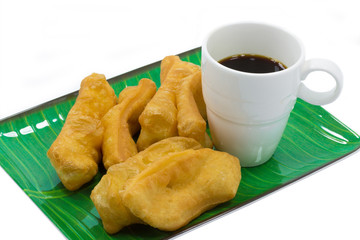 chinese doughnut with black coffee on white background