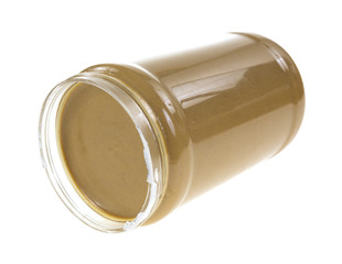 Jar of peanut butter on side