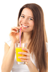Cute woman drinking orange juice