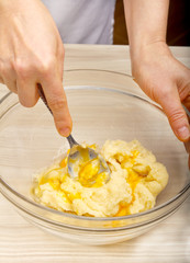 Woman kneading dough