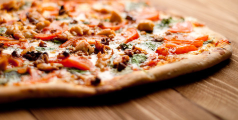 Delicious italian pizza served on wooden table