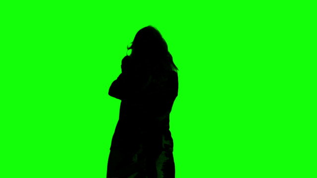 Silhouettes of couple meeting again on green screen