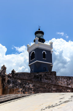clouds form behind LIghthouse at  El Morro,