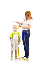woman measuring child