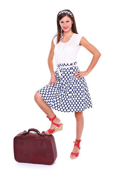 Pin up girl with suitcase