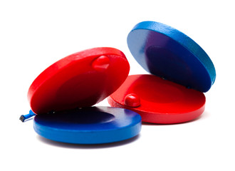 pair of red and blue castanets