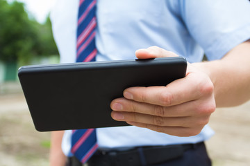 man in a helmet with a digital tablet