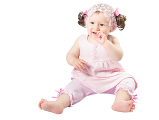 Adorable little child girl  in pink dress  isolated on white