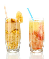 Delicious fruit smoothies isolated on white
