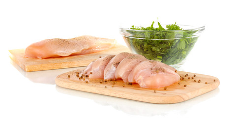 Chicken meat on board isolated on white