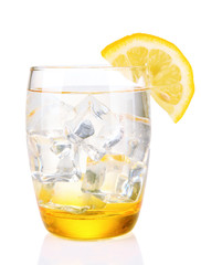 Glass with water and ice isolated on white