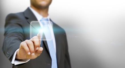 Businessman touching tactile interface