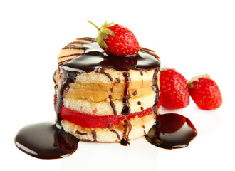 Tasty biscuit cake with chocolate and berries isolated on white