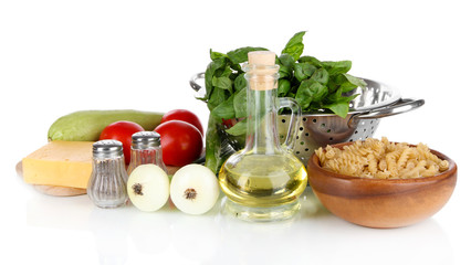 Ingredients for cooking pasta isolated on white
