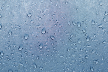 superficie textil y gotas de agua