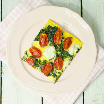 Spinach and tomato tart with feta cheese