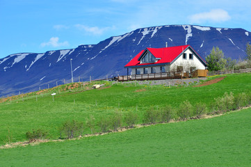 Red white house and mountain