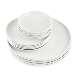 Pile of clean white dish plates isolated