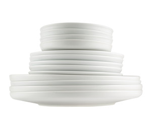 Pile of clean white dish plates isolated