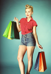 Girl with shopping bags retro style