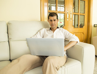 man working on laptop computer