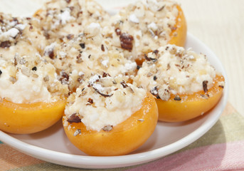 Apricots stuffed with cream cheese and walnuts.