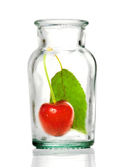 fresh cherry inside glass vase